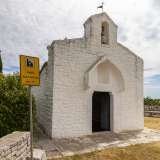 Proprietaria del tempio dal 1295 � la Basilica di San Nicola di Bari a cui quell�anno papa Bonifacio VIII cedette l�abbazia di Ognissanti di Valenzano a cui San Lorenzo faceva capo
